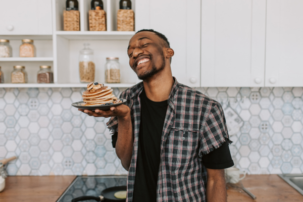 guy with pancakes smiling cedar rapids ia